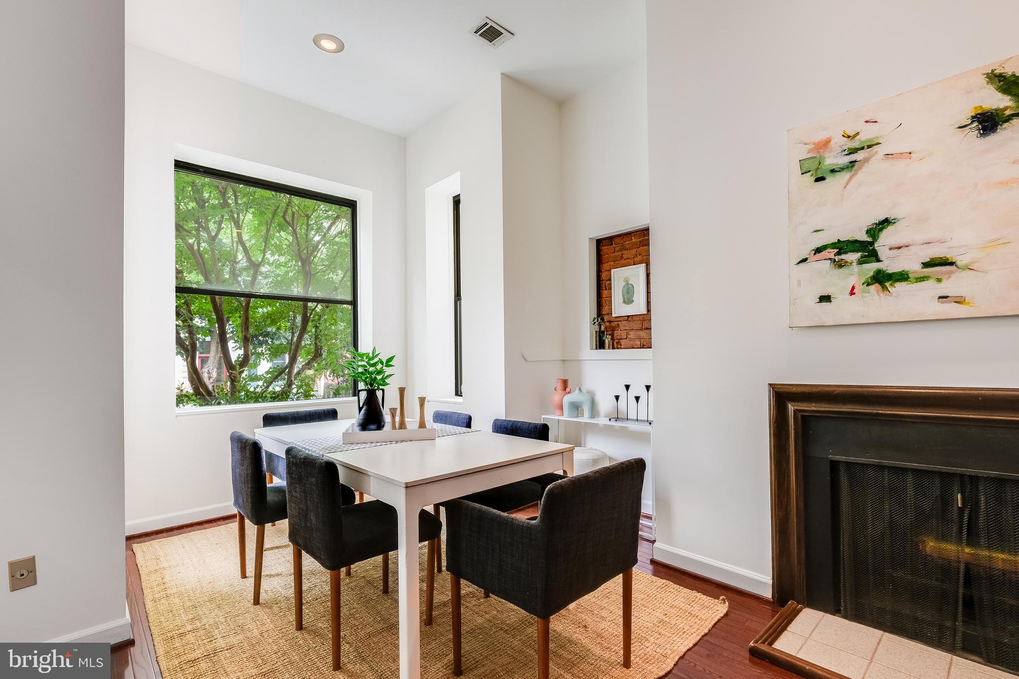 1326 R Street Northwest, Unit 2 Washington, DC 20009 - Photo 5 of 15 Dining area in bay window + fireplace