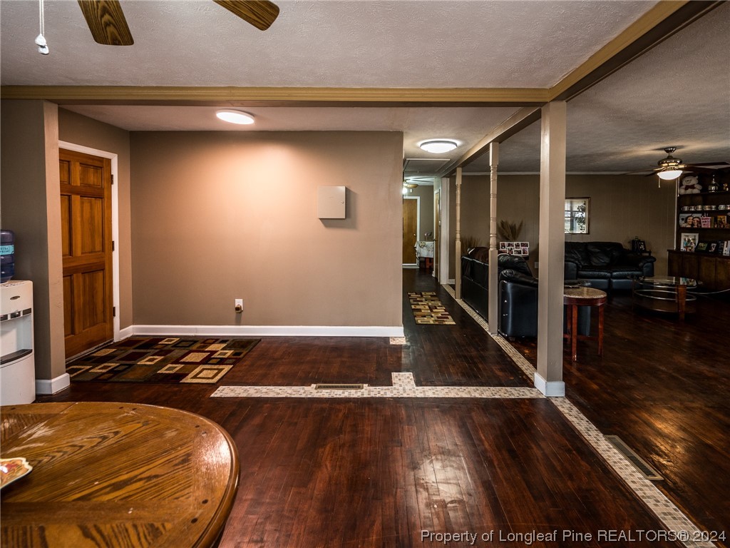 1982 Rowan Road, Unit R Lumberton, NC 28358 - Photo 21 of 43 a view of a room with wooden floor
