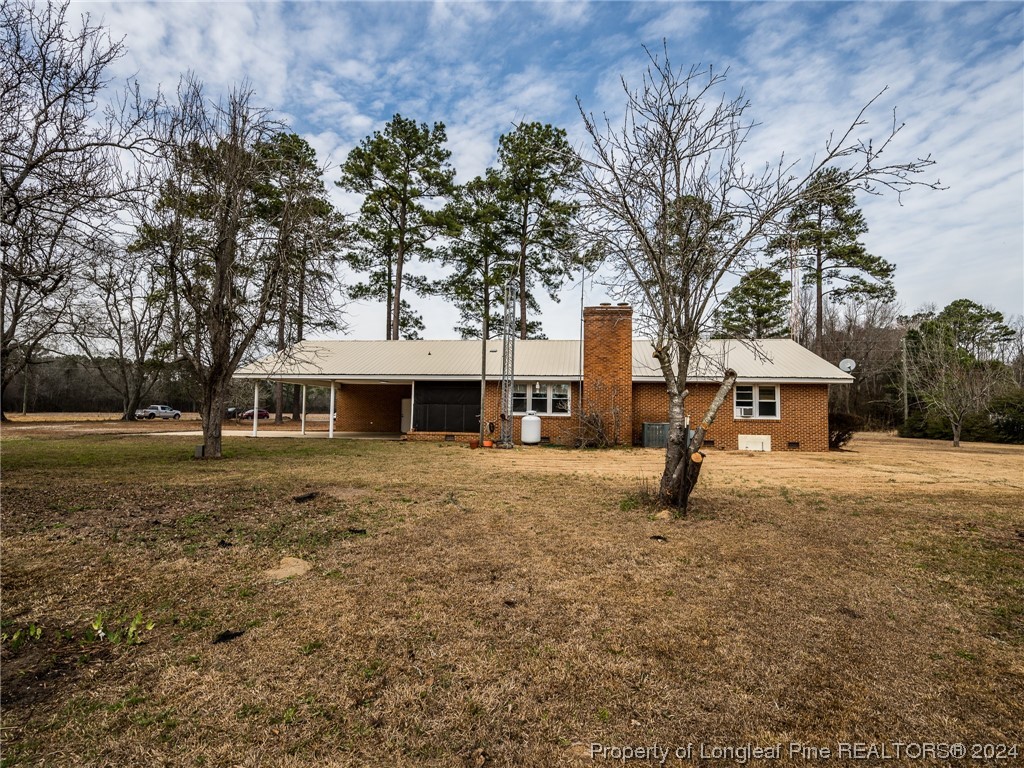 1982 Rowan Road, Unit R Lumberton, NC 28358 - Photo 4 of 43 a view of a house with a yard