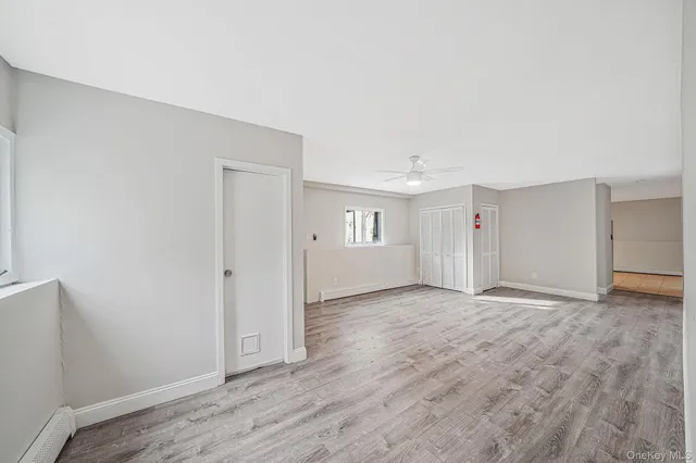 a view of an empty room and window