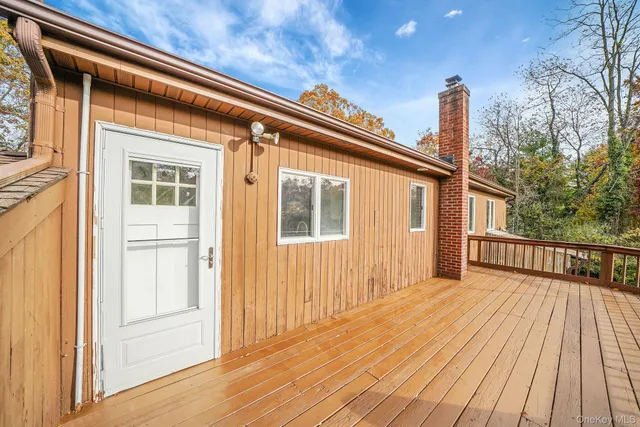 a view of a house with a large window