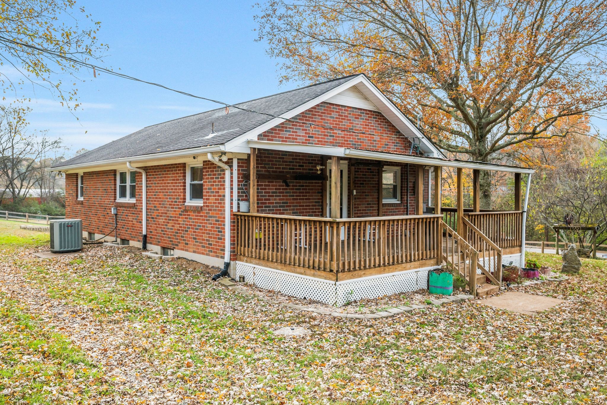 435 Dry Creek Road Goodlettsville, TN 37072 - Photo 18 of 34 a view of a house with wooden fence