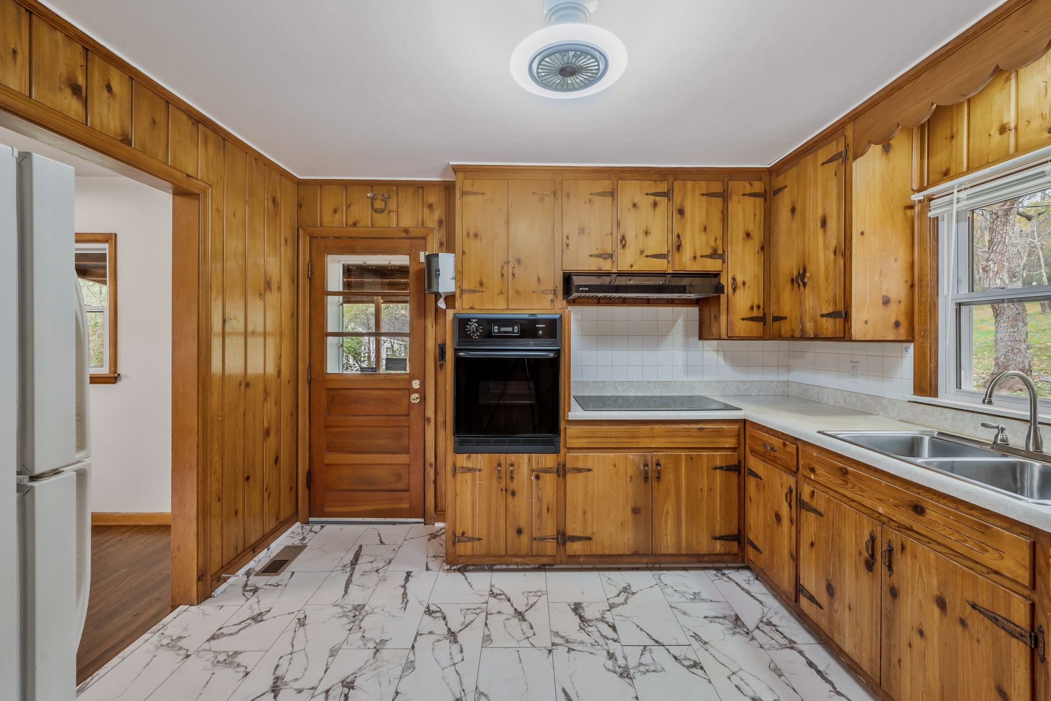 435 Dry Creek Road Goodlettsville, TN 37072 - Photo 5 of 34 a kitchen with stainless steel appliances granite countertop a refrigerator and a sink