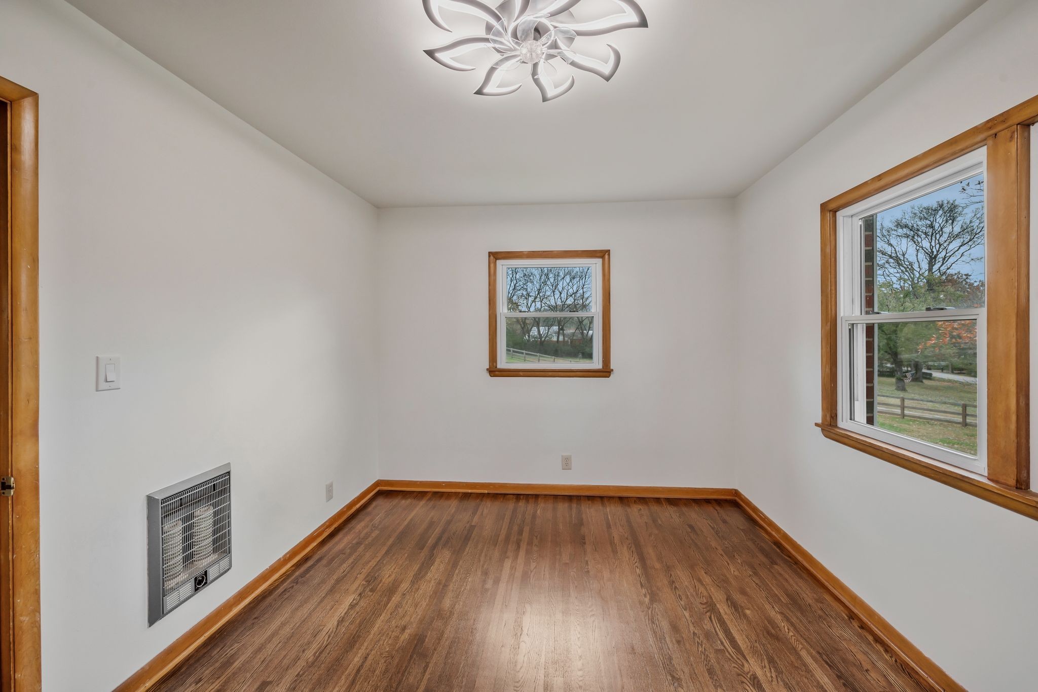 435 Dry Creek Road Goodlettsville, TN 37072 - Photo 8 of 34 a view of empty room with wooden floor and fan