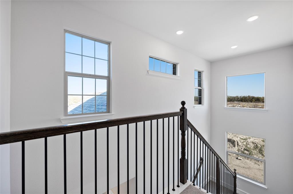 613 Brazos Drive Van Alstyne, TX 75495 - Photo 20 of 29 Stairway with recessed lighting