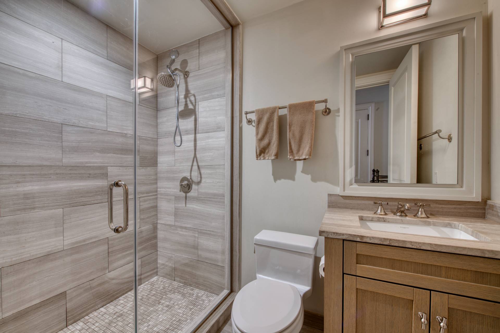 4 Sage Street Sag Harbor, NY 11963 - Photo 7 of 19 a bathroom with a sink a toilet and shower