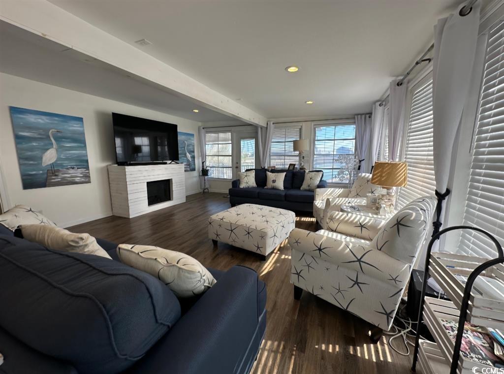315 Inlet Road Murrells Inlet, SC 29576 - Photo 8 of 19 Living room featuring beamed ceiling, wood finished floors, recessed lighting, and a fireplace
