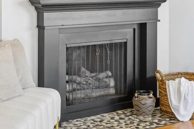 a kitchen with a sink cabinets and window