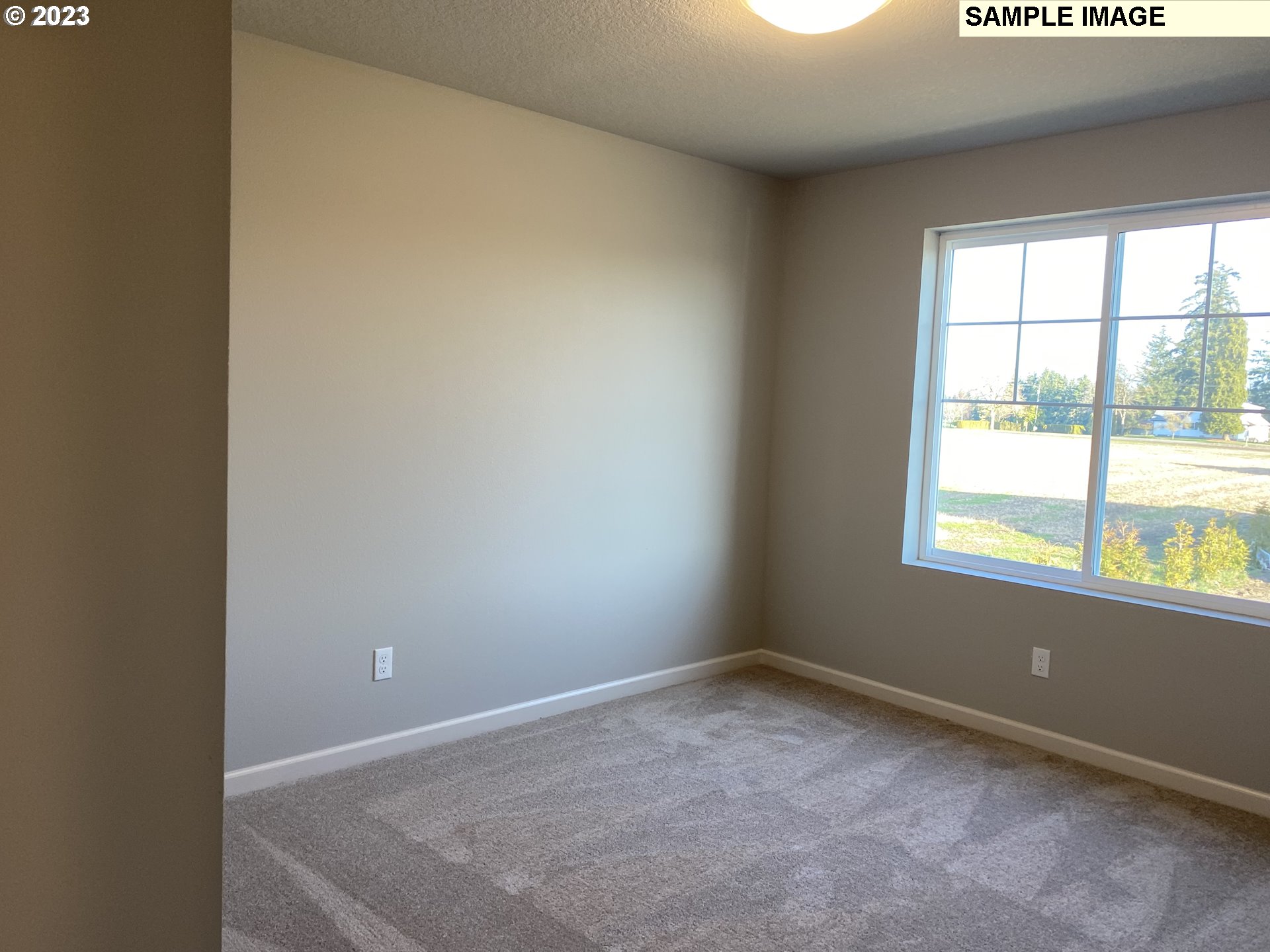 1020 Marie Street Mount Angel, OR 97362 - Photo 11 of 15 an empty room with a window