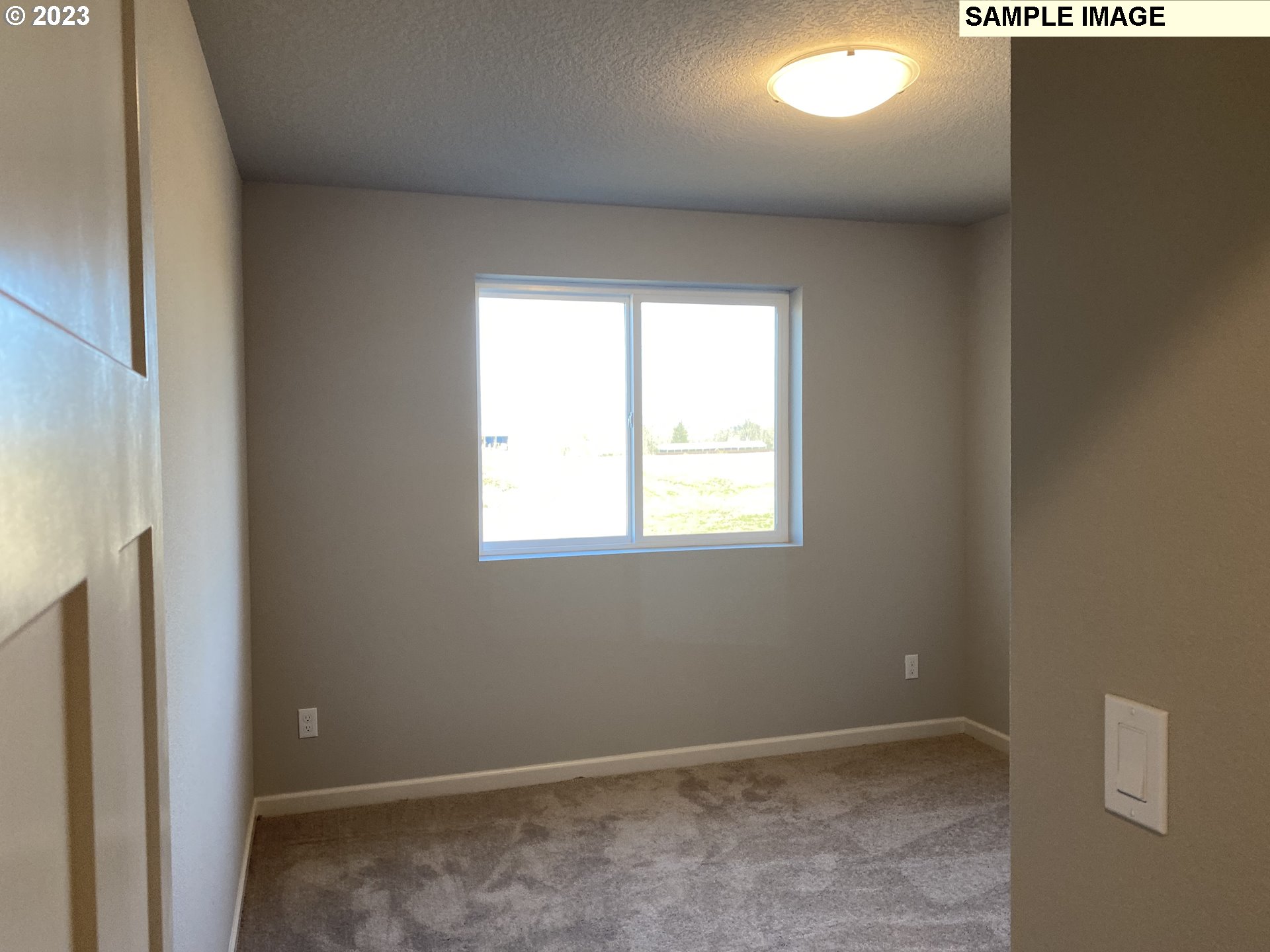 1020 Marie Street Mount Angel, OR 97362 - Photo 12 of 15 a view of an empty room with a window