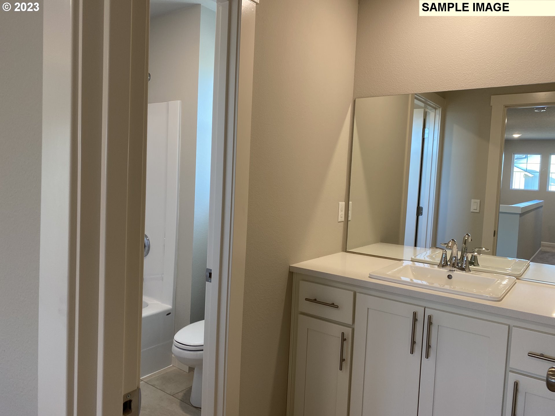 1020 Marie Street Mount Angel, OR 97362 - Photo 13 of 15 a bathroom with a sink a toilet and a mirror