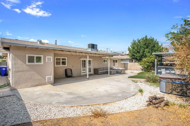 a view of a house with a patio