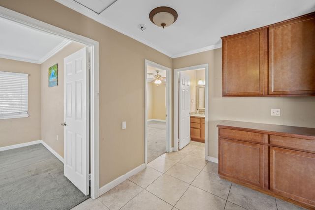 a view of a kitchen with cabinets
