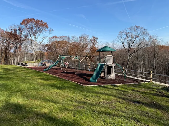a view of swimming pool having patio