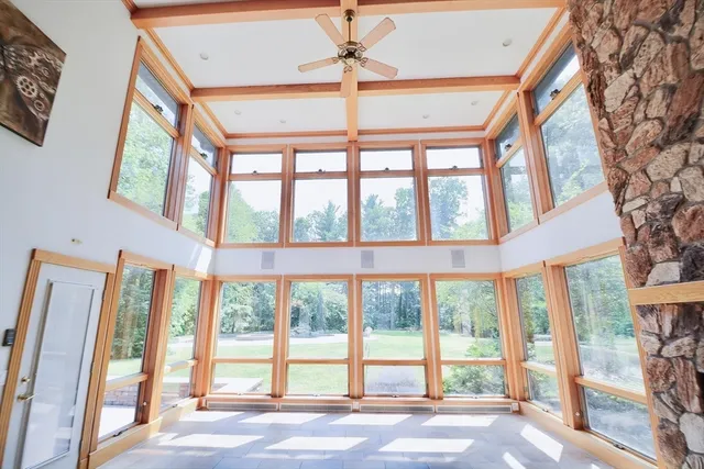 a view of an empty room with a large window