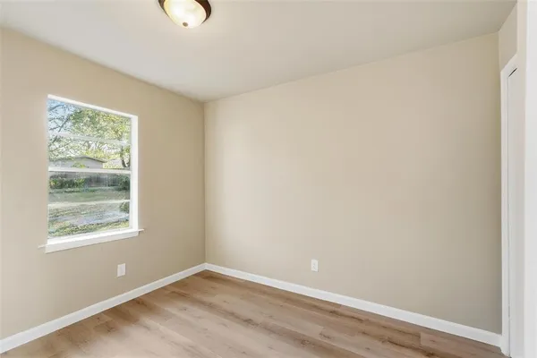 an empty room with windows
