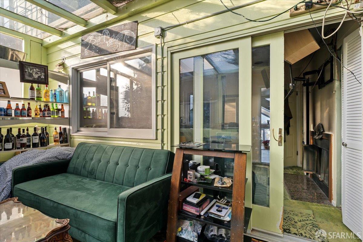 130 Ripley Street San Francisco, CA 94110 - Photo 23 of 69 a living room with furniture and a window