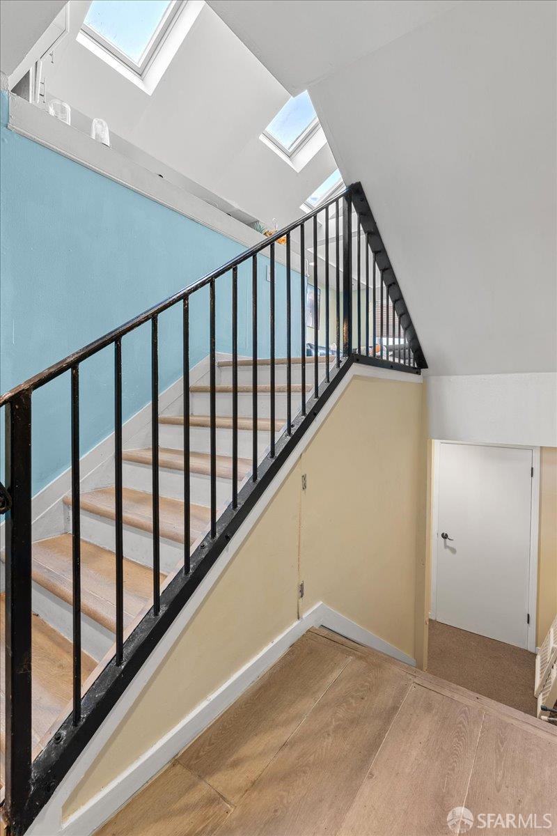 130 Ripley Street San Francisco, CA 94110 - Photo 29 of 69 a view of staircase with rug