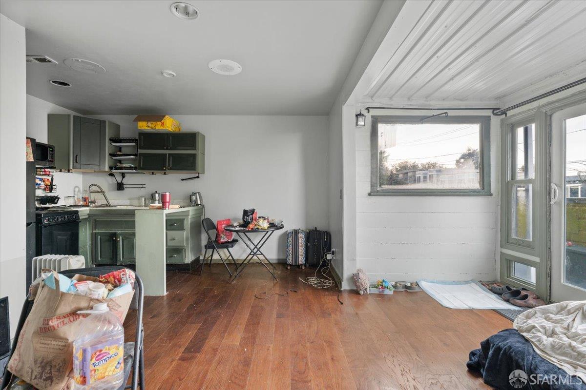 130 Ripley Street San Francisco, CA 94110 - Photo 54 of 69 a bedroom with furniture and a window