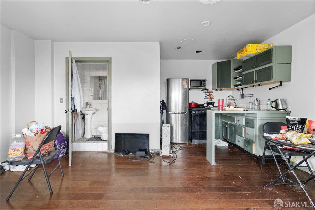 130 Ripley Street San Francisco, CA 94110 - Photo 56 of 69 a dining room with furniture and wooden floor