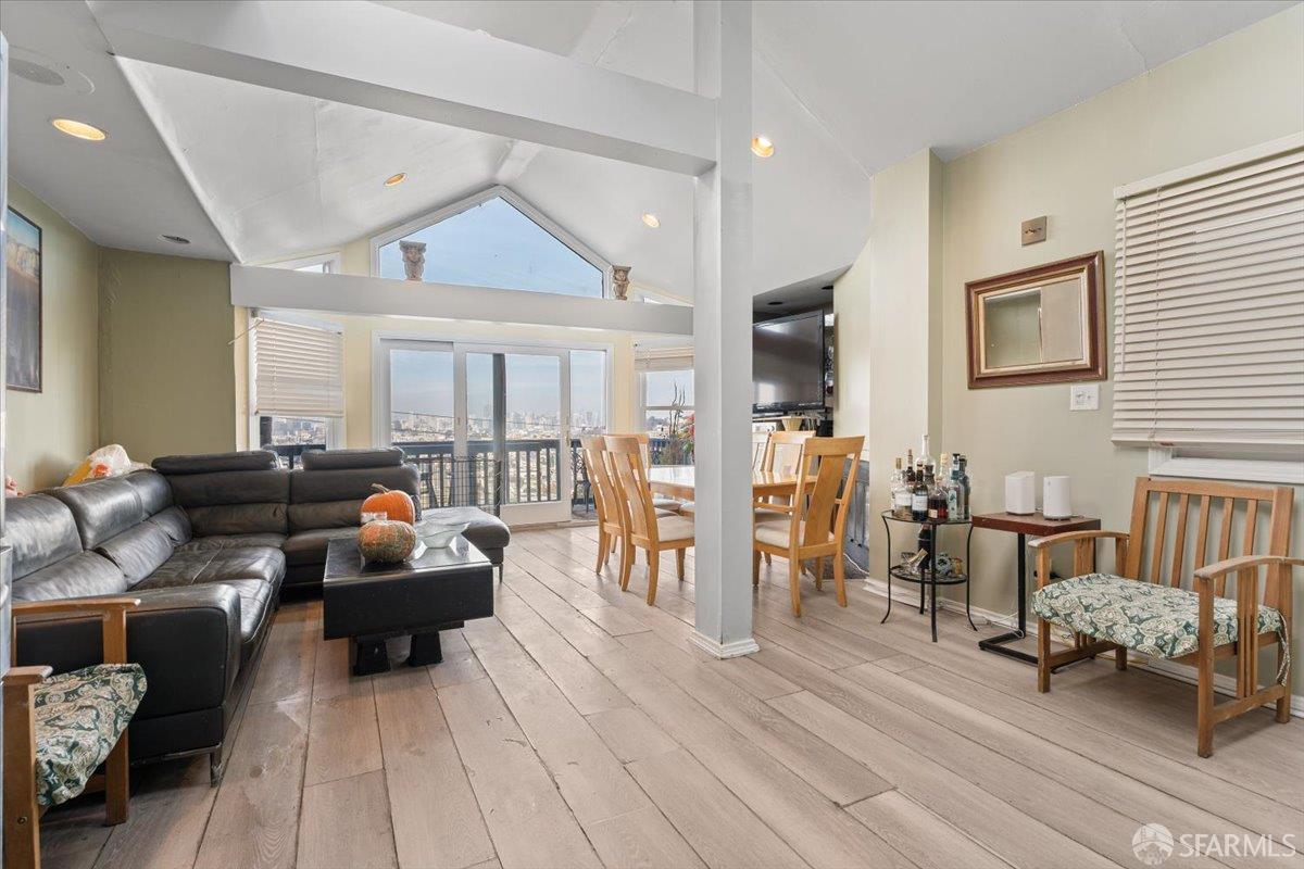 130 Ripley Street San Francisco, CA 94110 - Photo 9 of 69 a living room with furniture and a wooden floor