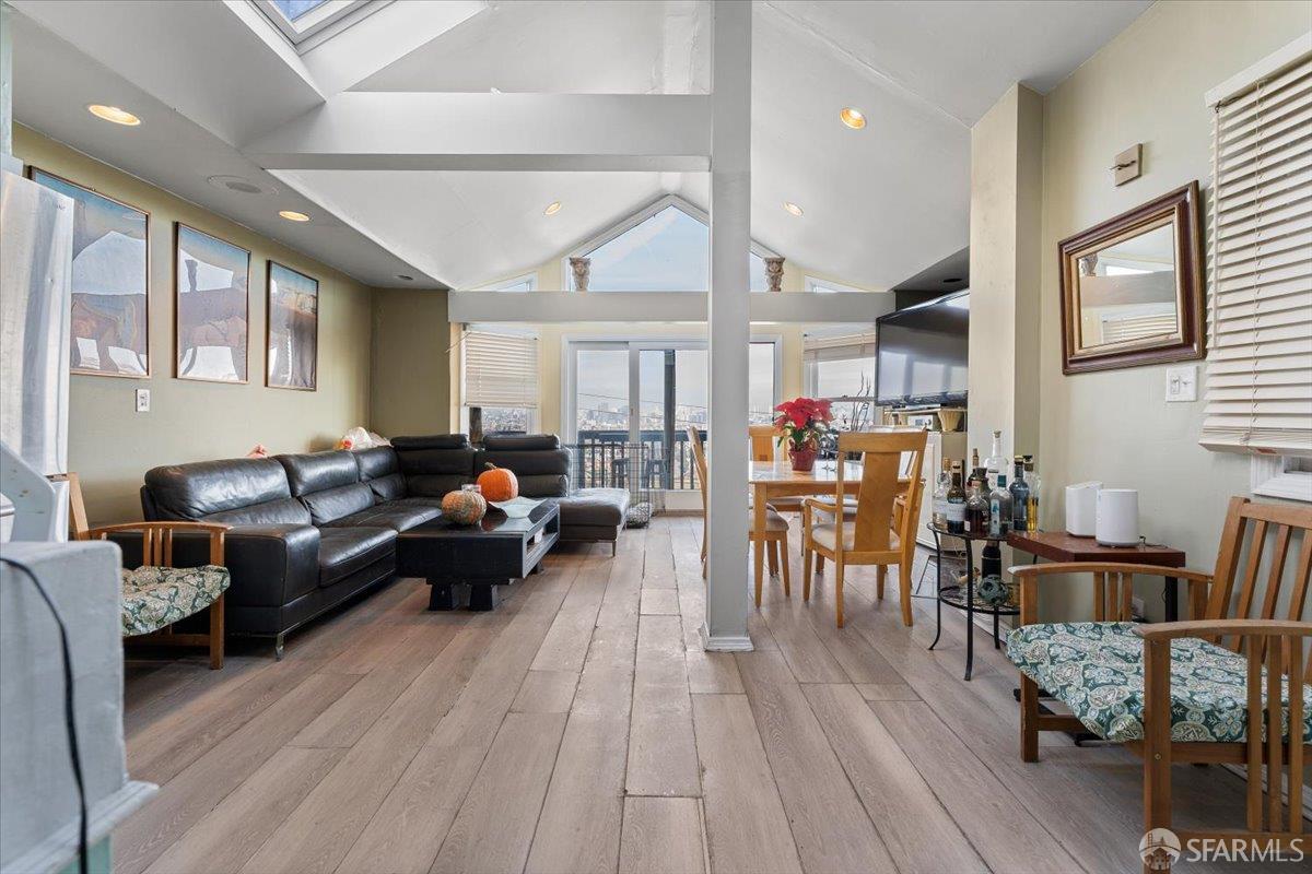 130 Ripley Street San Francisco, CA 94110 - Photo 10 of 69 a living room with furniture and wooden floor