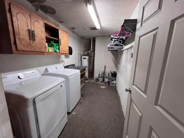 a view of a storage & utility room with stuff