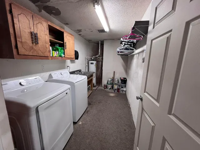 a view of a storage & utility room with stuff