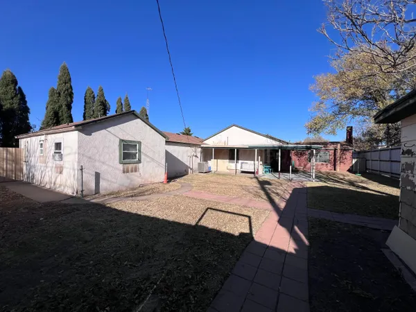 a front view of a house with yard