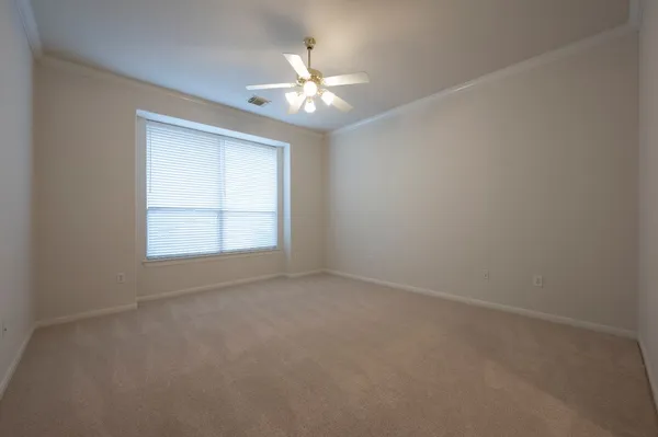 a spacious bathroom with a bathtub sink and mirror