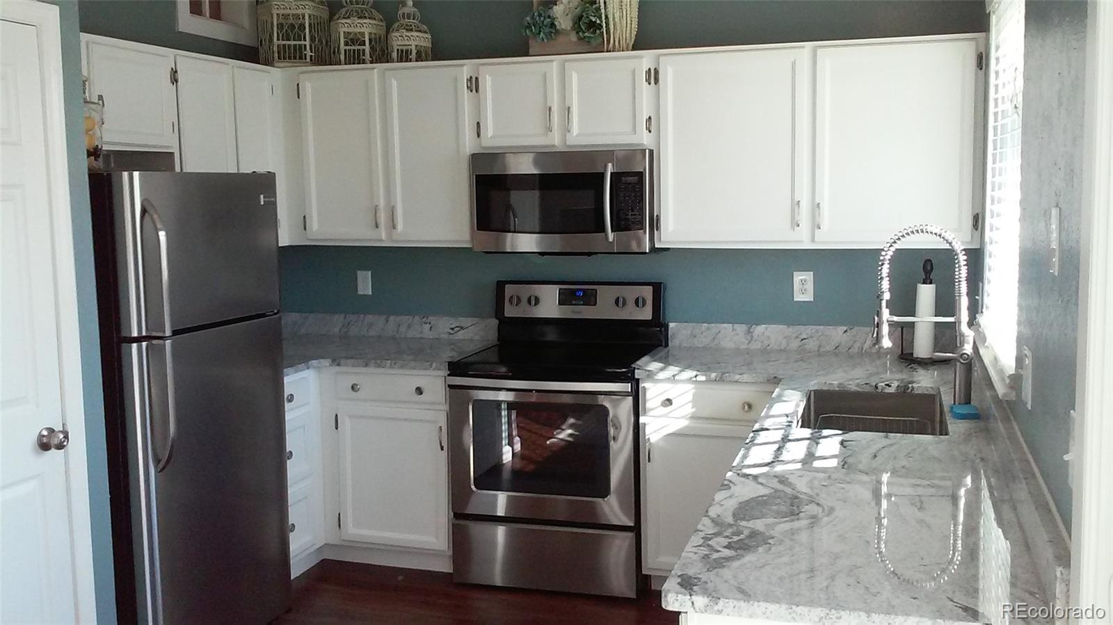 8539 Rabbitbrush Way Parker, CO 80134 - Photo 7 of 21 Gallery Image 7