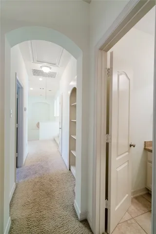 a view of a bathroom with a glass door shower