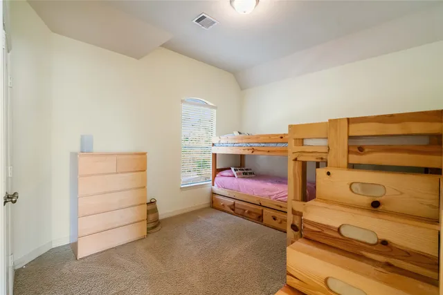 a room with storage and utility room