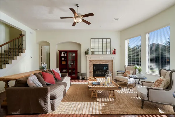 a living room with furniture or couch and a fireplace