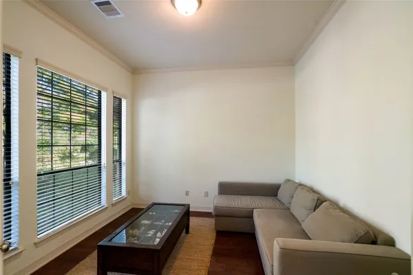 a view of entryway with wooden floor