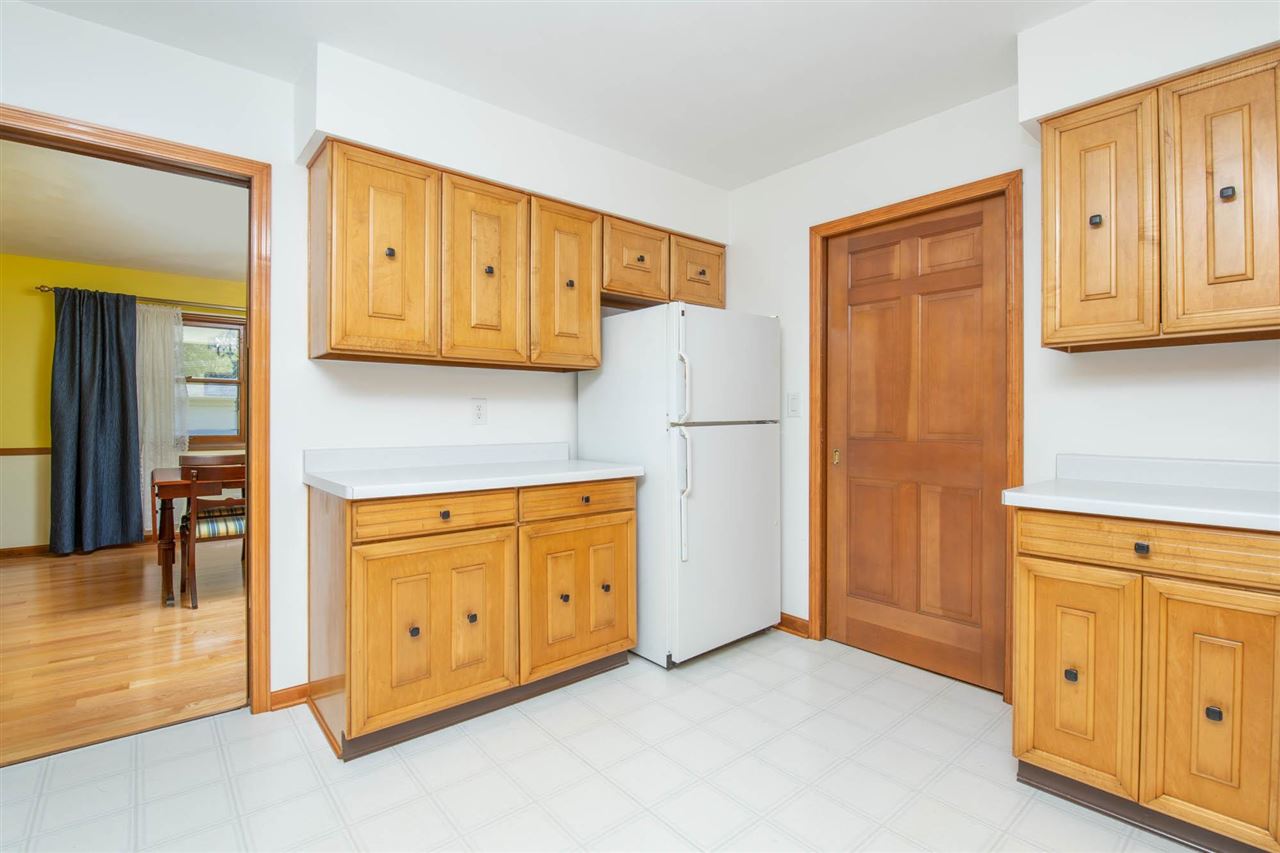 4960 Welsh Road Rockford, IL 61107 - Photo 15 of 39 a view of a kitchen with refrigerator and a sink