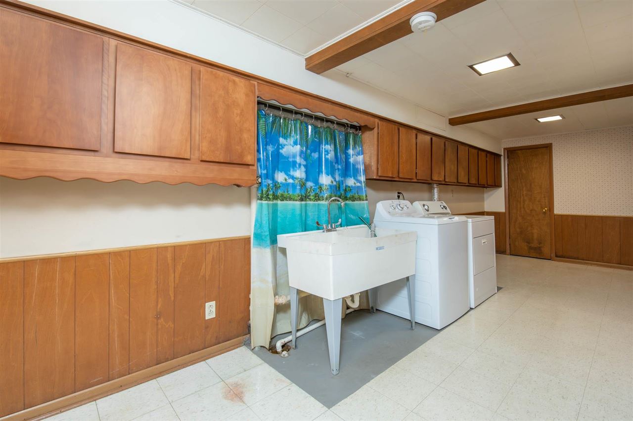 4960 Welsh Road Rockford, IL 61107 - Photo 34 of 39 a kitchen with refrigerator and cabinets