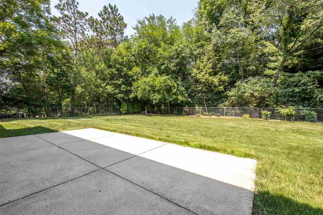 4960 Welsh Road Rockford, IL 61107 - Photo 38 of 39 a view of a swimming pool and a yard