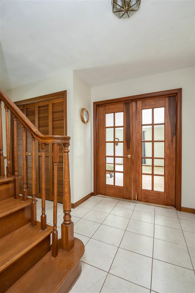 4960 Welsh Road Rockford, IL 61107 - Photo 4 of 39 a view of an empty room with windows