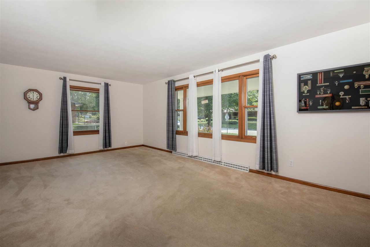 4960 Welsh Road Rockford, IL 61107 - Photo 6 of 39 a view of an empty room with a window