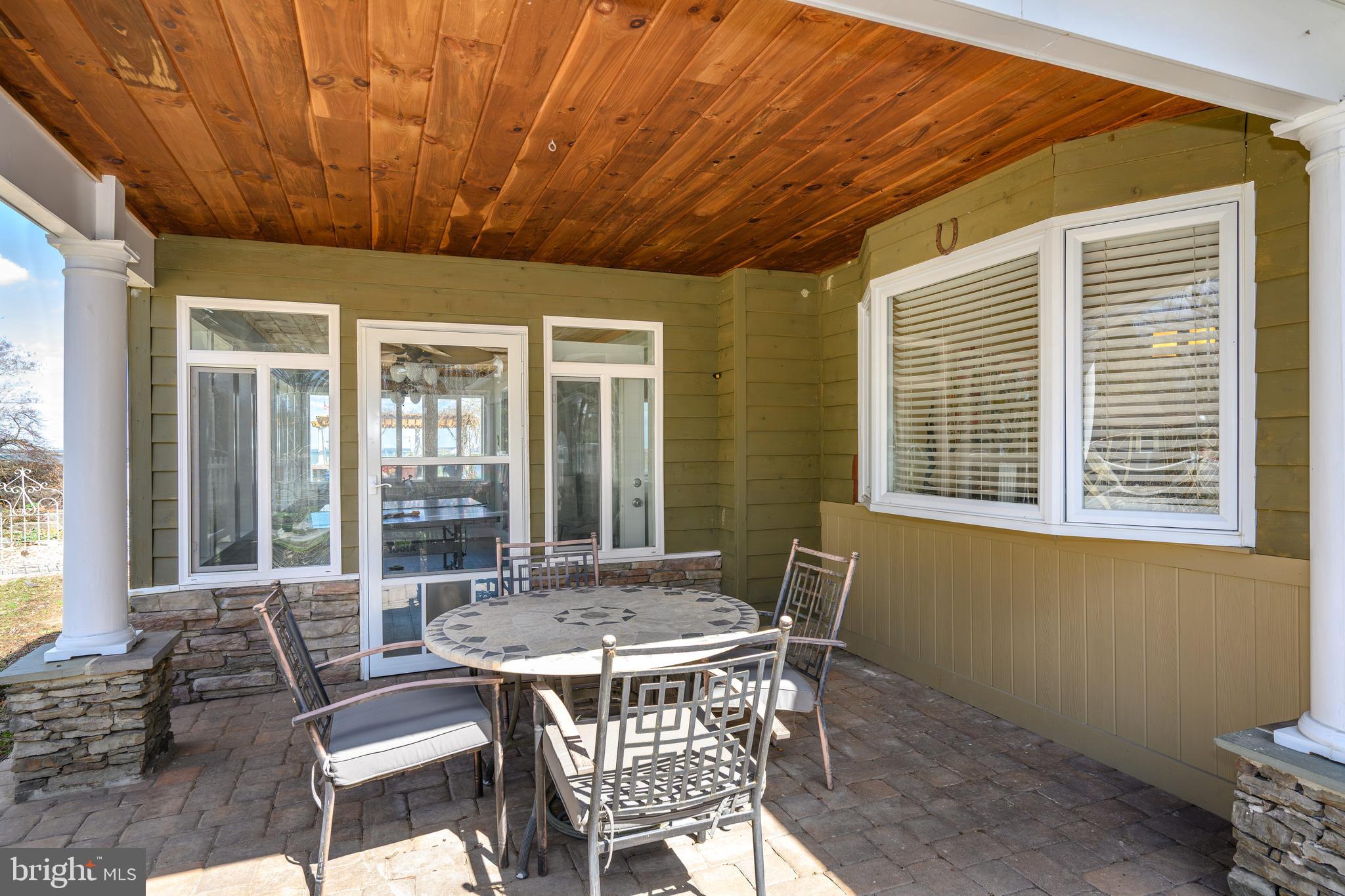 110 Perrys Road Grasonville, MD 21638 - Photo 68 of 68 Porch 2 sitting area