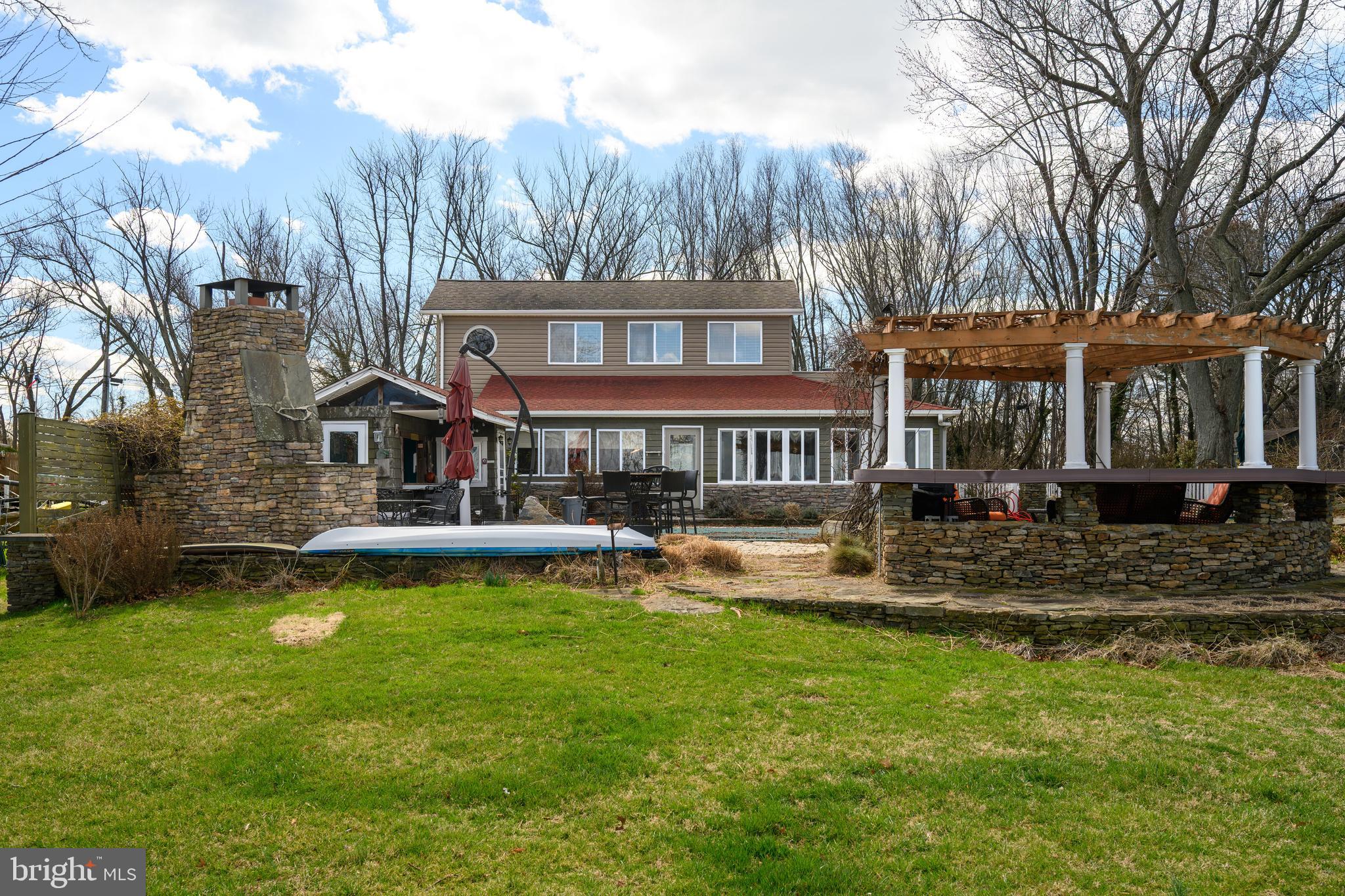 110 Perrys Road Grasonville, MD 21638 - Photo 9 of 68 Exterior rear looking back at house water side