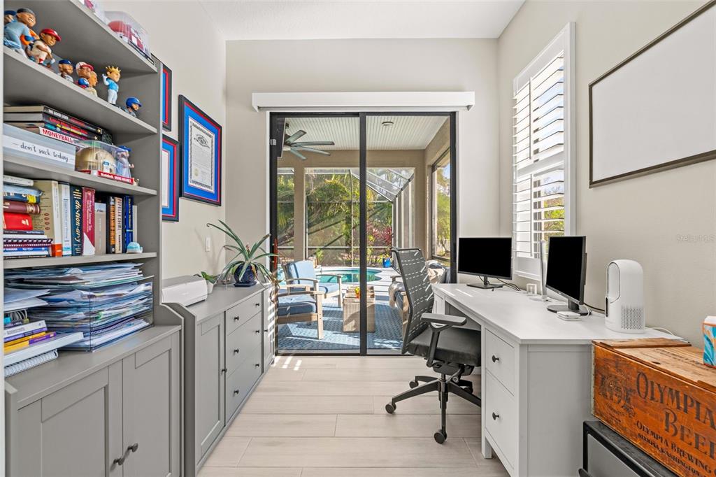 6470 Indigo Bunting Place Lakewood Ranch, FL 34202 - Photo 31 of 65 a view of a workspace with furniture and a window