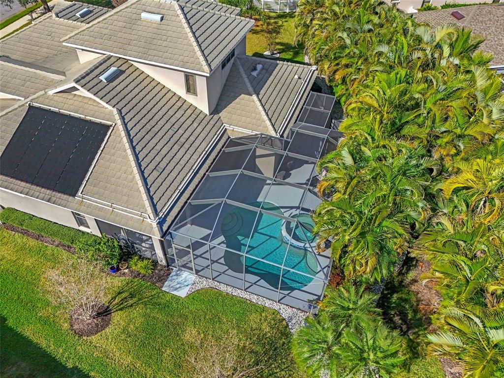 6470 Indigo Bunting Place Lakewood Ranch, FL 34202 - Photo 62 of 65 a view of balcony with a table and chairs