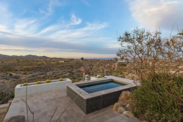 a spacious bathroom with a tub and shower