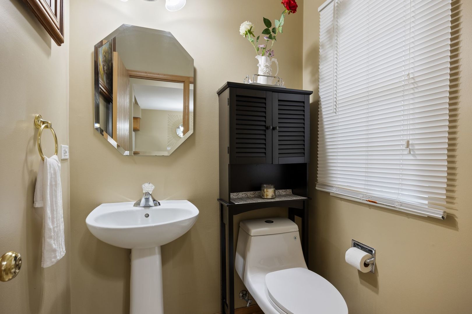 1024 Key Largo Drive Romeoville, IL 60446 - Photo 11 of 25 a bathroom with a toilet sink and mirror