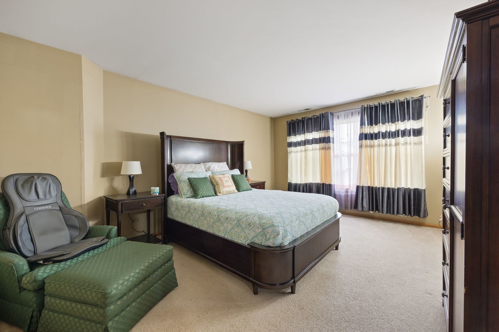1024 Key Largo Drive Romeoville, IL 60446 - Photo 12 of 25 a spacious bedroom with a bed and window