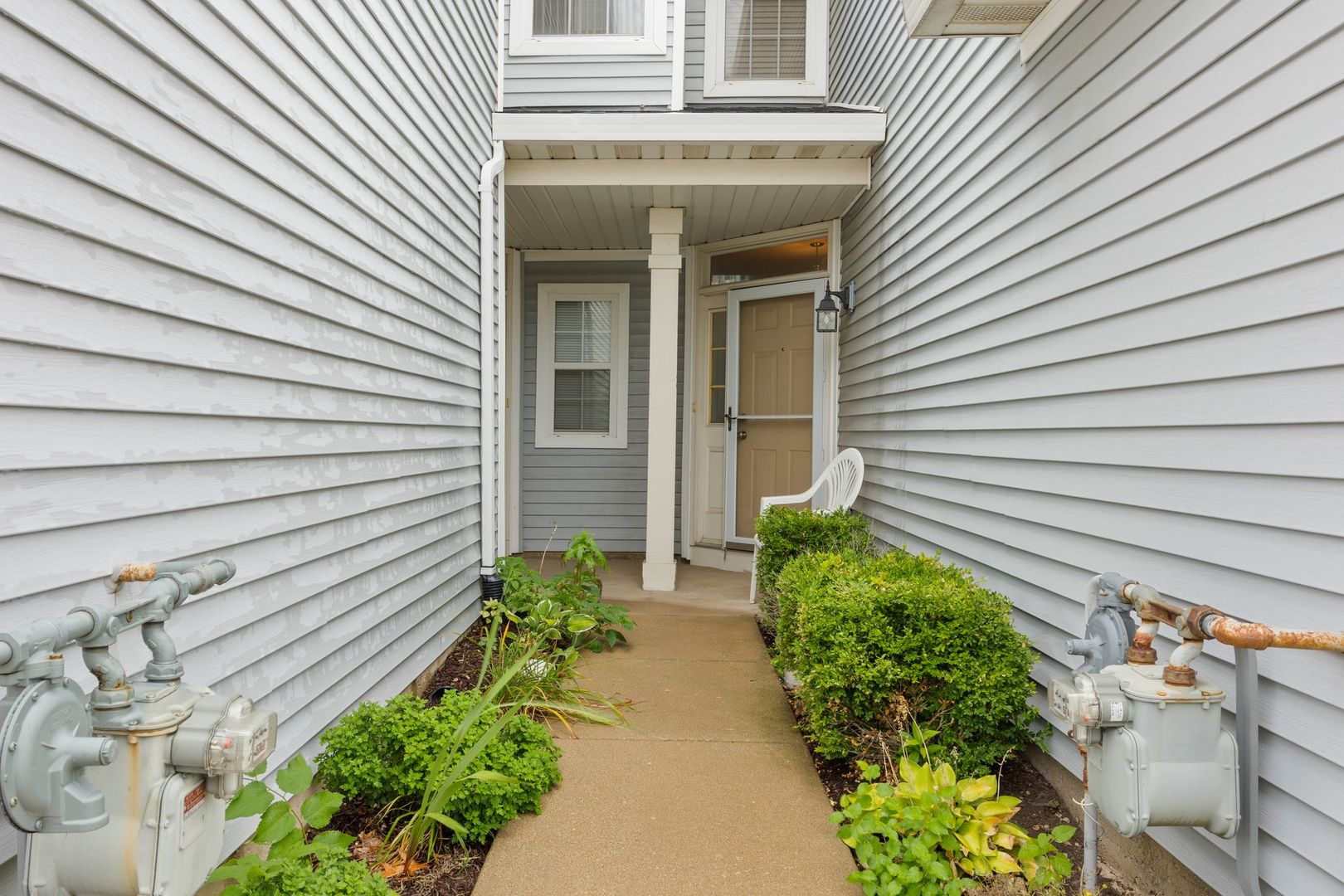 1024 Key Largo Drive Romeoville, IL 60446 - Photo 23 of 25 a view of a pathway with a house