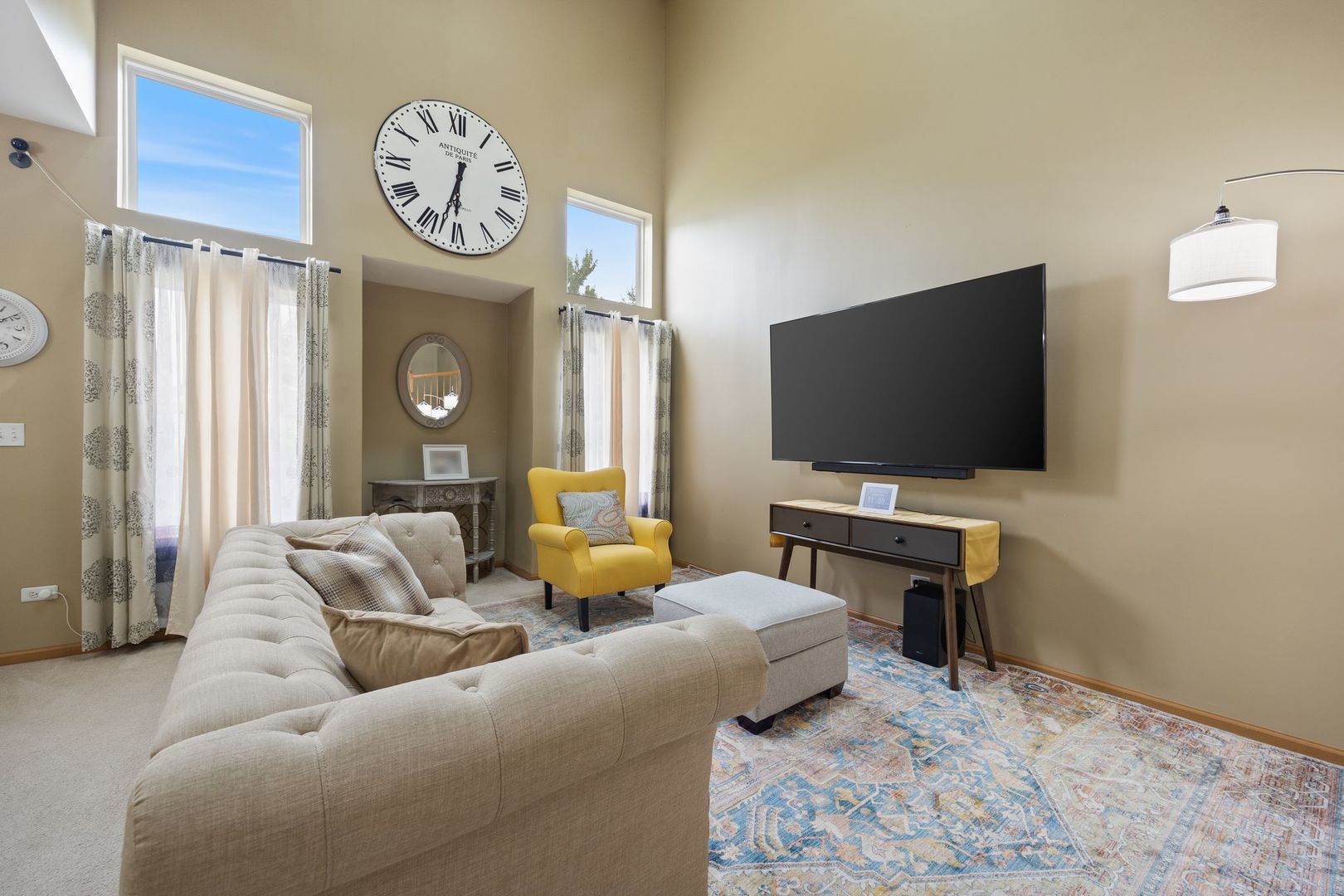 1024 Key Largo Drive Romeoville, IL 60446 - Photo 3 of 25 a living room with furniture and a flat screen tv