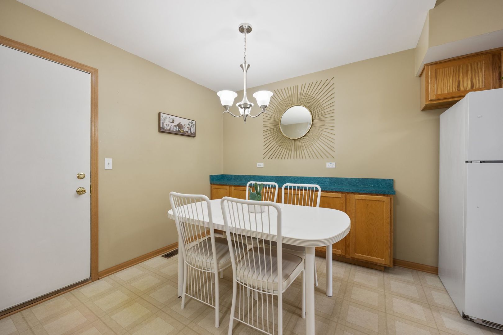1024 Key Largo Drive Romeoville, IL 60446 - Photo 10 of 25 a view of a dining room with furniture and chandelier